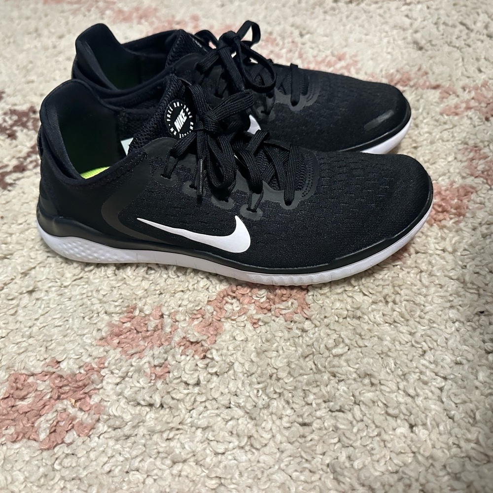 Nike Black Running Shoes with White Swoosh